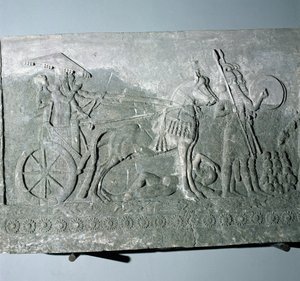 Sargón II (721-705 a.C.) en un carro de batalla, del Palacio de Sargón II en Khorsabad, Irak